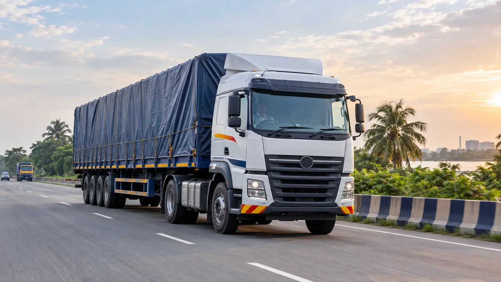 Road transport truck at sunset